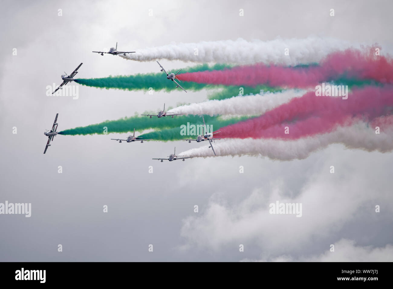 The Italian Air Force Military Aerobatic Display Team Il Frecce Tricolori in their Aermacchi AT-339A jet trainer aircraft put on a superb display. Stock Photo