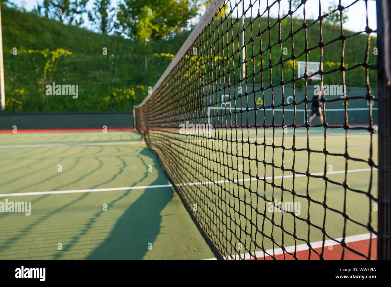 Tennis court net close up in sunny day Stock Photo Alamy