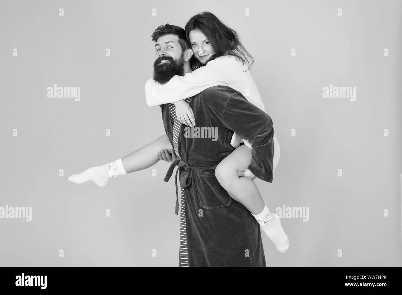 https://c8.alamy.com/comp/WW7NPK/deep-in-love-having-fun-perfect-morning-happy-family-couple-woman-and-bearded-man-in-robe-romantinc-couple-in-love-honeymoon-trip-cheerful-coup-WW7NPK.jpg