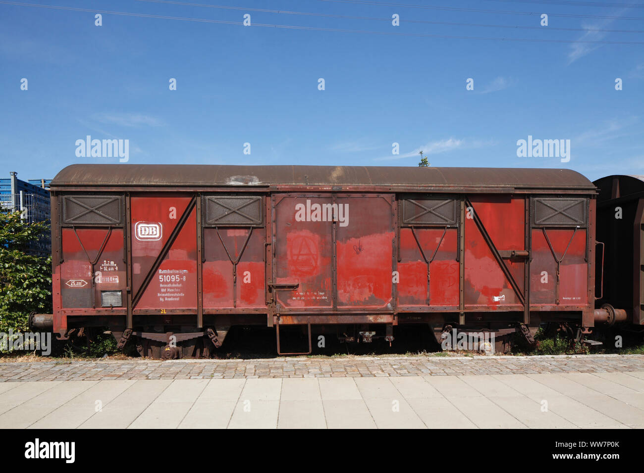 Old red freight car standing on a rail in the Harburg inland harbour, Harburg, Hamburg, Germany, Europe Stock Photo