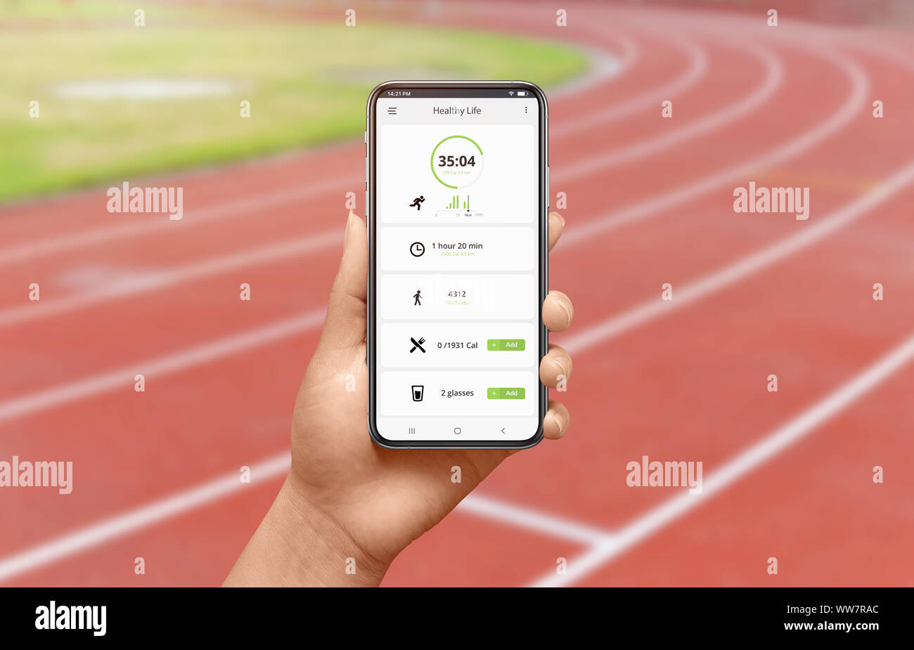 Phone app on running track in woman hand concept. App with Stock Photo