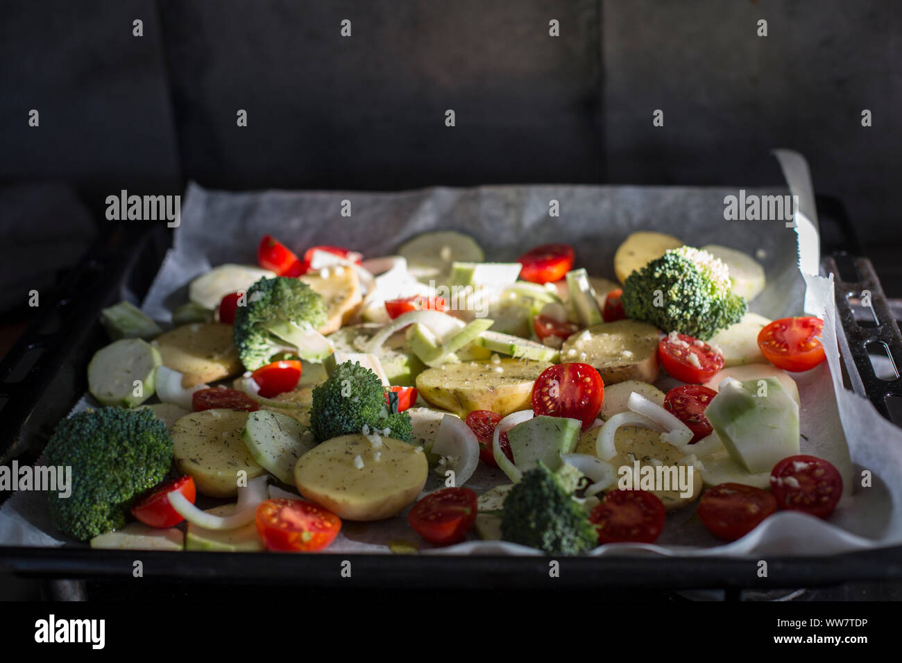 Ovenroasted vegetables on baking sheet Stock Photo Alamy