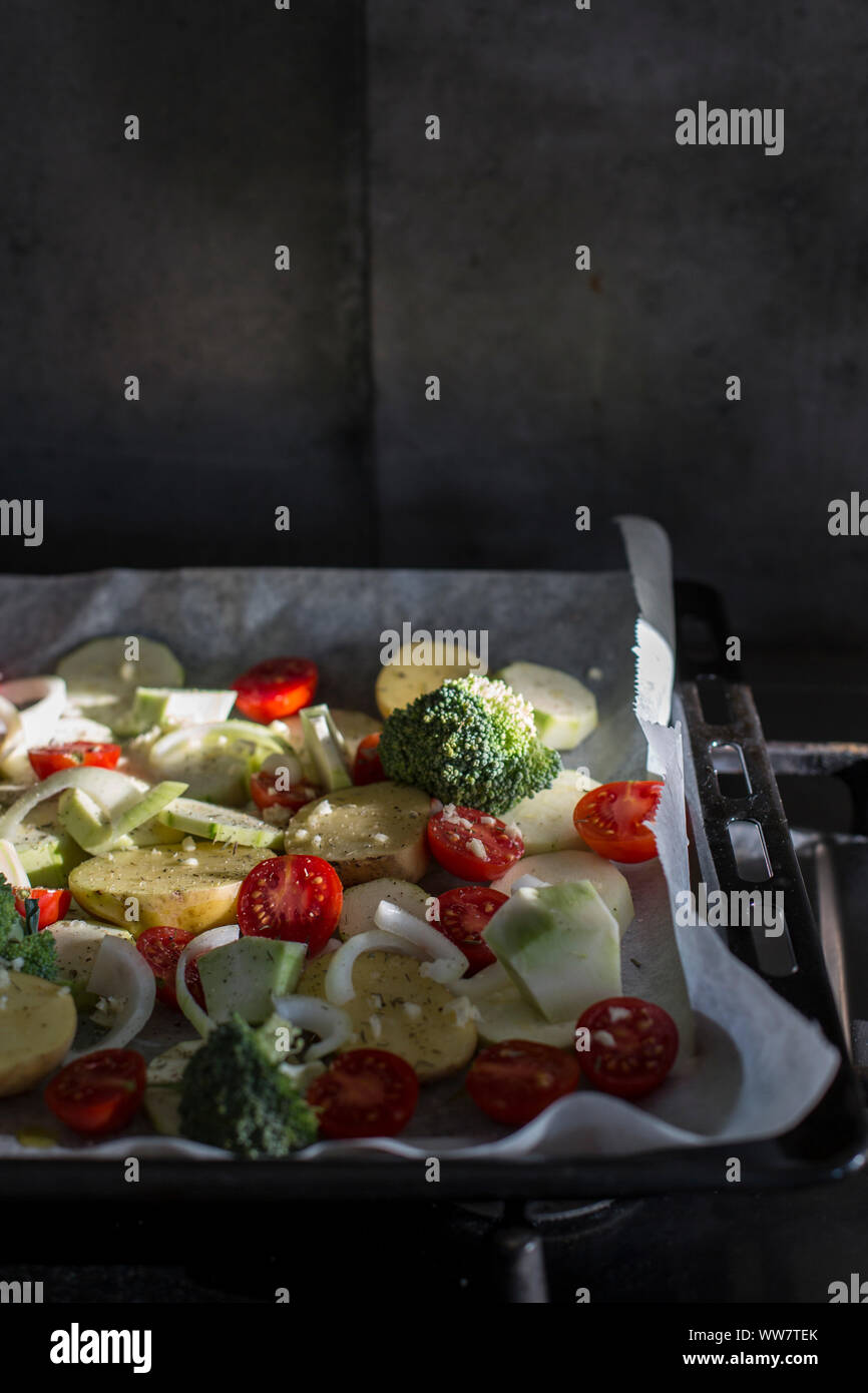 Ovenroasted vegetables on baking sheet Stock Photo Alamy