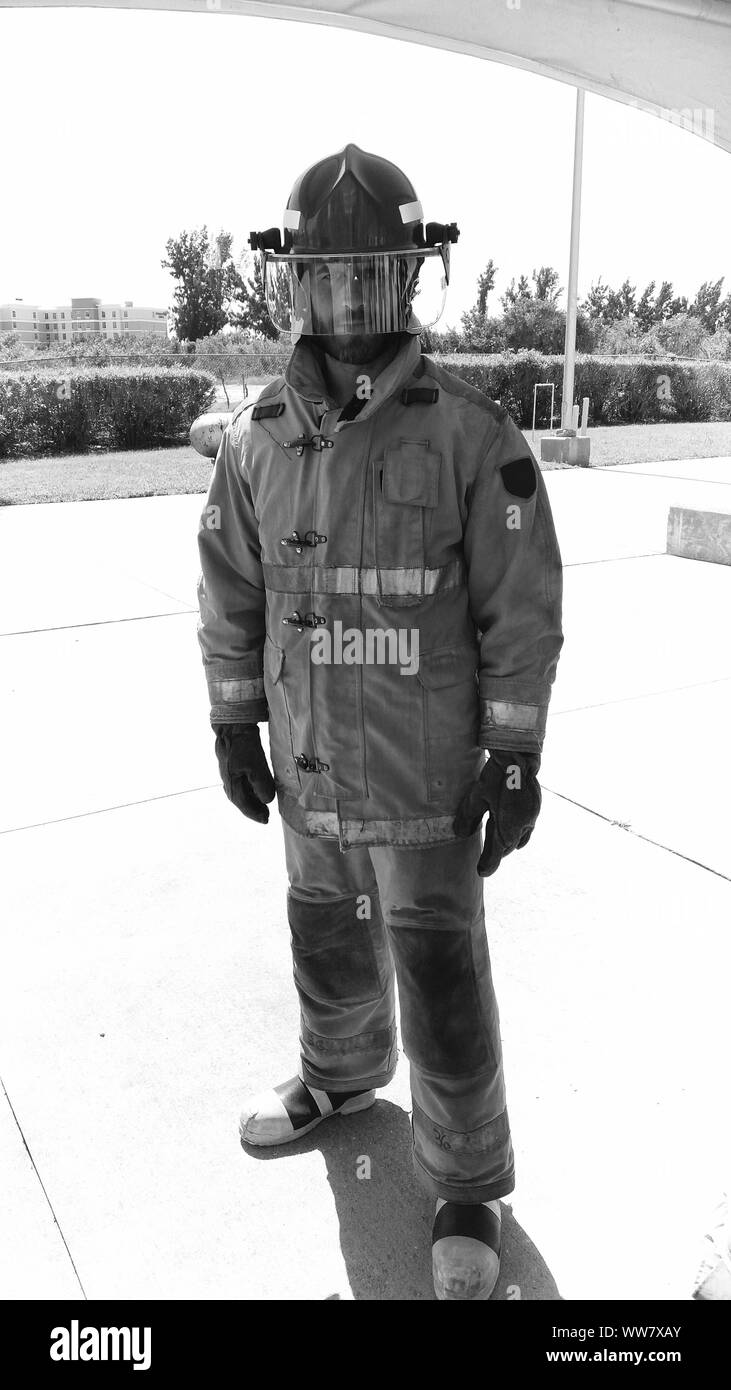 My job is extinguish fires. On guard. Firefighter with uniform and