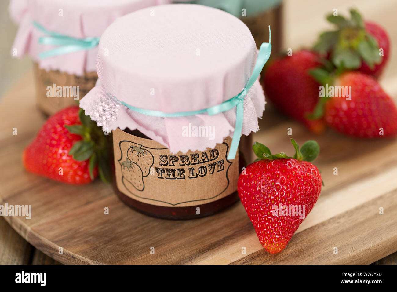 Strawberry jam, preserving jar, serving tray Stock Photo Alamy