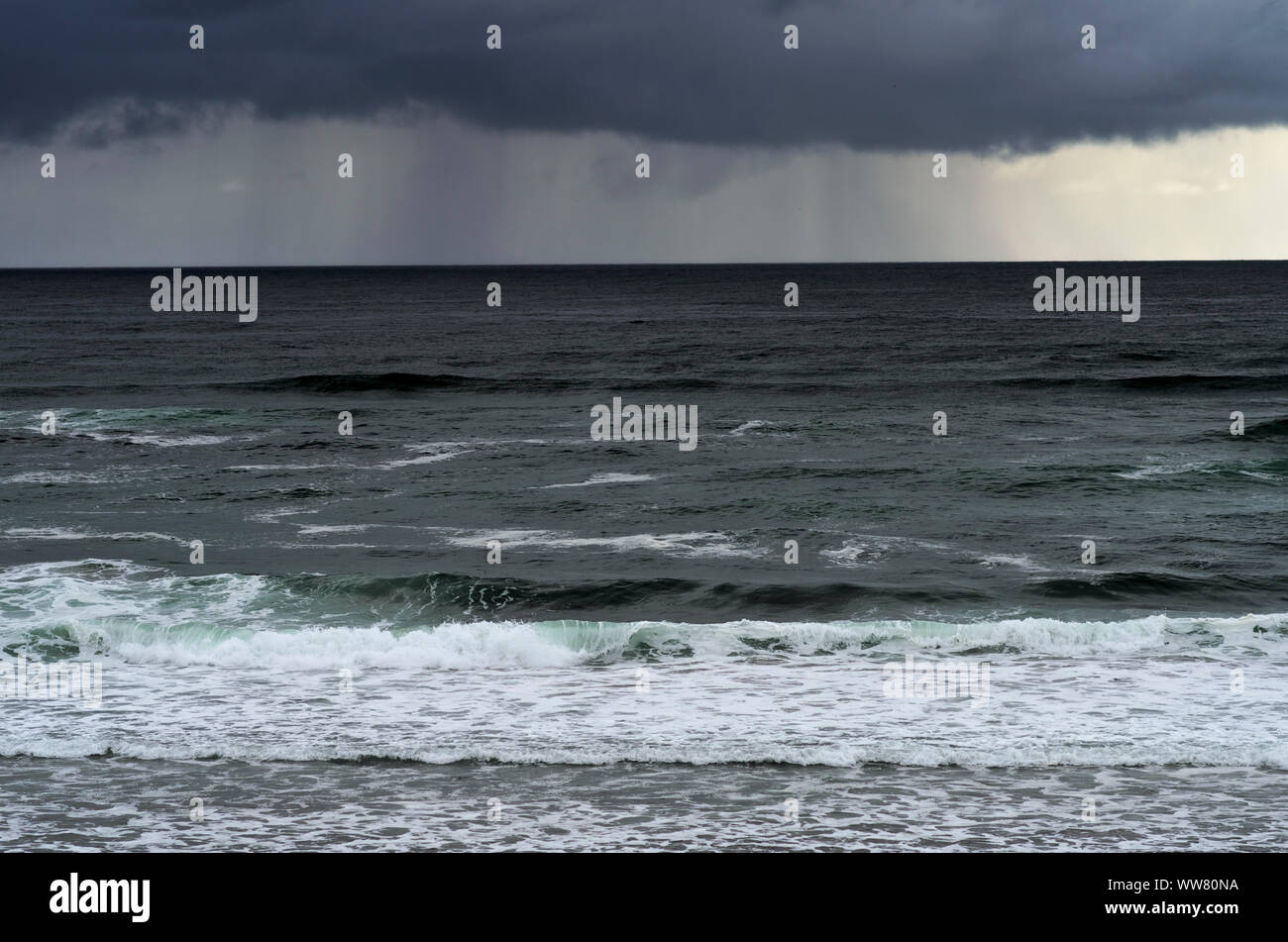 A thunderstorm rages over the Pacific Ocean, at the Pacific City beach ...