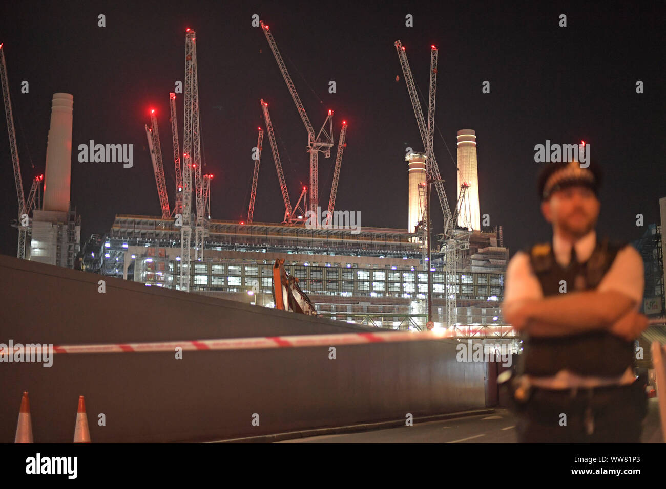 Police outside Battersea Power Station in London after a security alert. Stock Photo