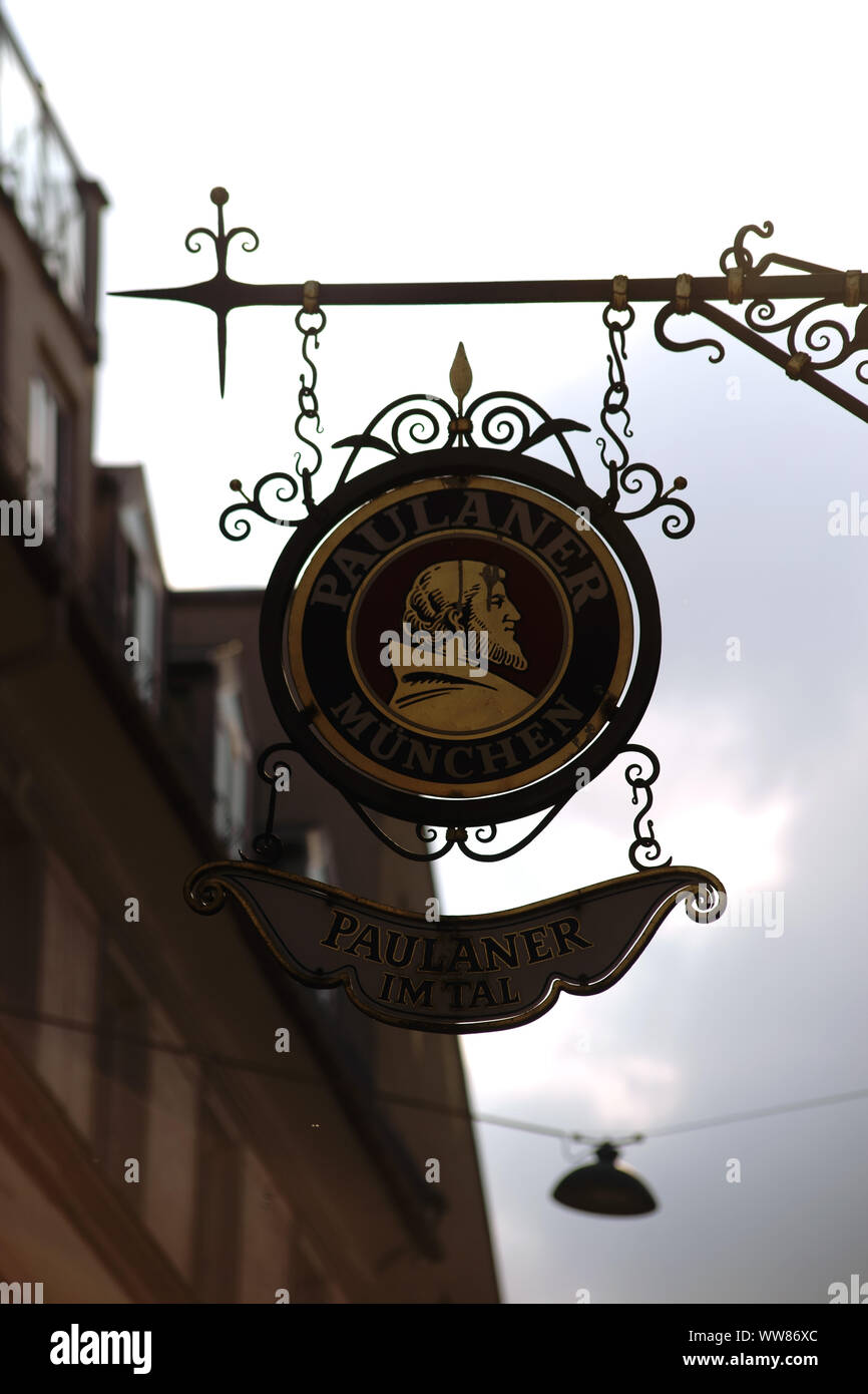 The coat of arms of the Paulaner brewery above an entrance of a restaurant in Munich Stock Photo