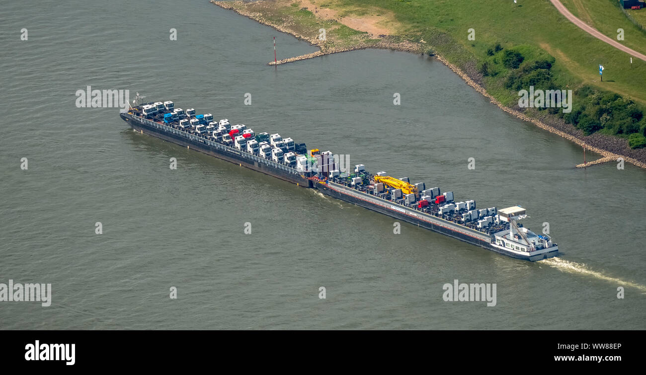 Aerial view, cargo ship on the Rhine going uphill, push boat with additional lighter, tractors and trucks are the freight, inland shipping Duisburg, Ruhrgebiet, North Rhine-Westphalia, Germany Stock Photo