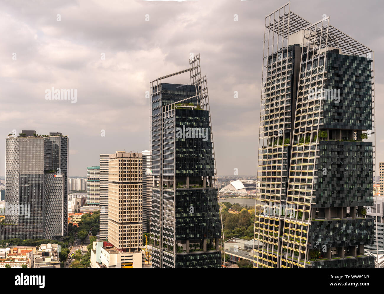 Singapore - March 20, 2019: Combination shot of black Facebook and Rabo Bank skyscrapers, Andaz and Mastercard to the left, and JW Marriott towers to Stock Photo