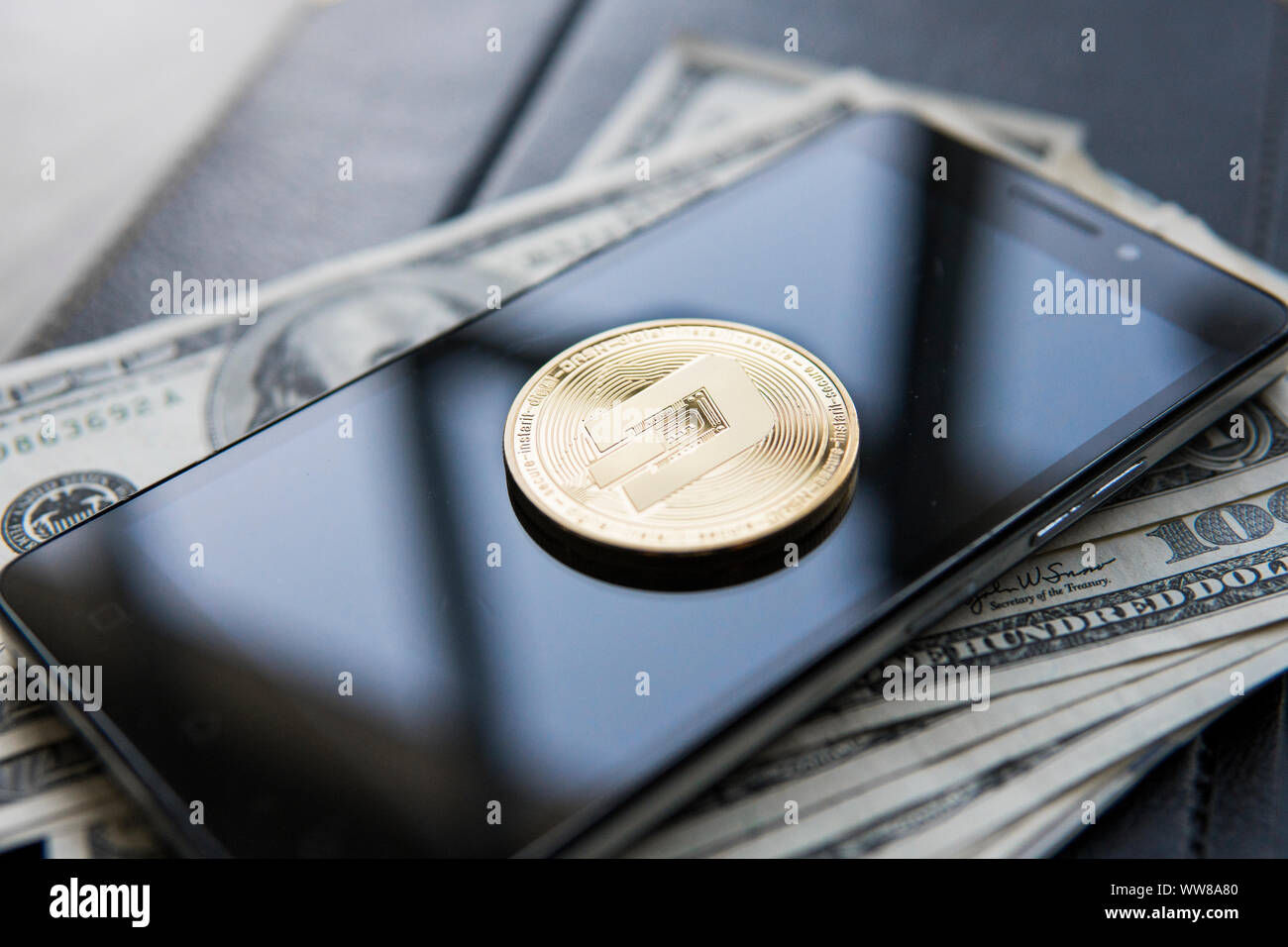 Dash coin with dollars on the background, cryptocurrency exchange concept,  business and new virtual money Stock Photo - Alamy