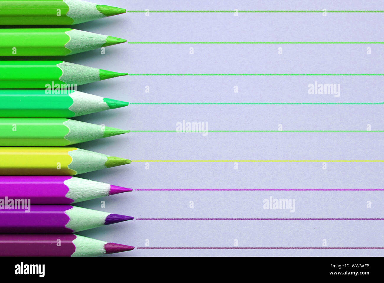 Bright and sharp colorful pencils on background with straight lines. Stock Photo