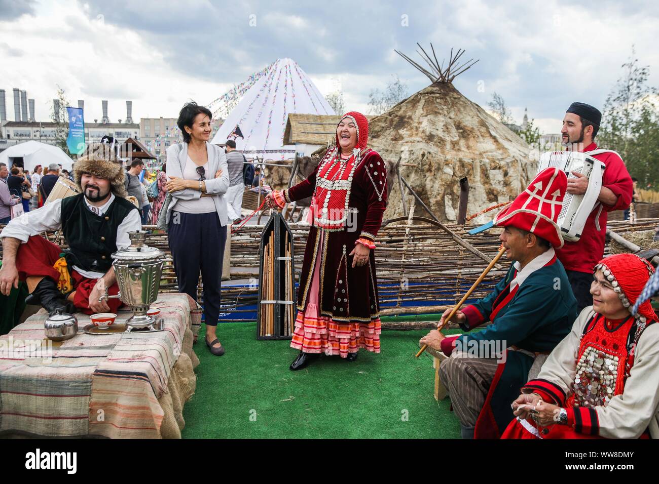 Moscow, Russia. 13th Sep, 2019. Representatives of Bashkortostan Republic perform at their site during the Russian Geographical Society Festival at Zaryadye park in Moscow, Russia, on Sept. 13, 2019. The 4th Russian Geographical Society Festival is held from Sept. 13 to Sept. 22 in Moscow. Visitors will be able to get acquainted with the diverse nature and cultural heritage of Russia during the festival. Credit: Maxim Chernavsky/Xinhua Stock Photo