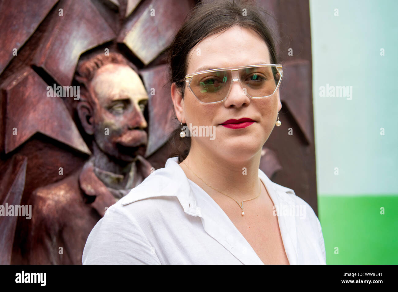 Academy Award nominated trans Chilean actress Daniela Vega in front of bust of Jose Marti Stock Photo