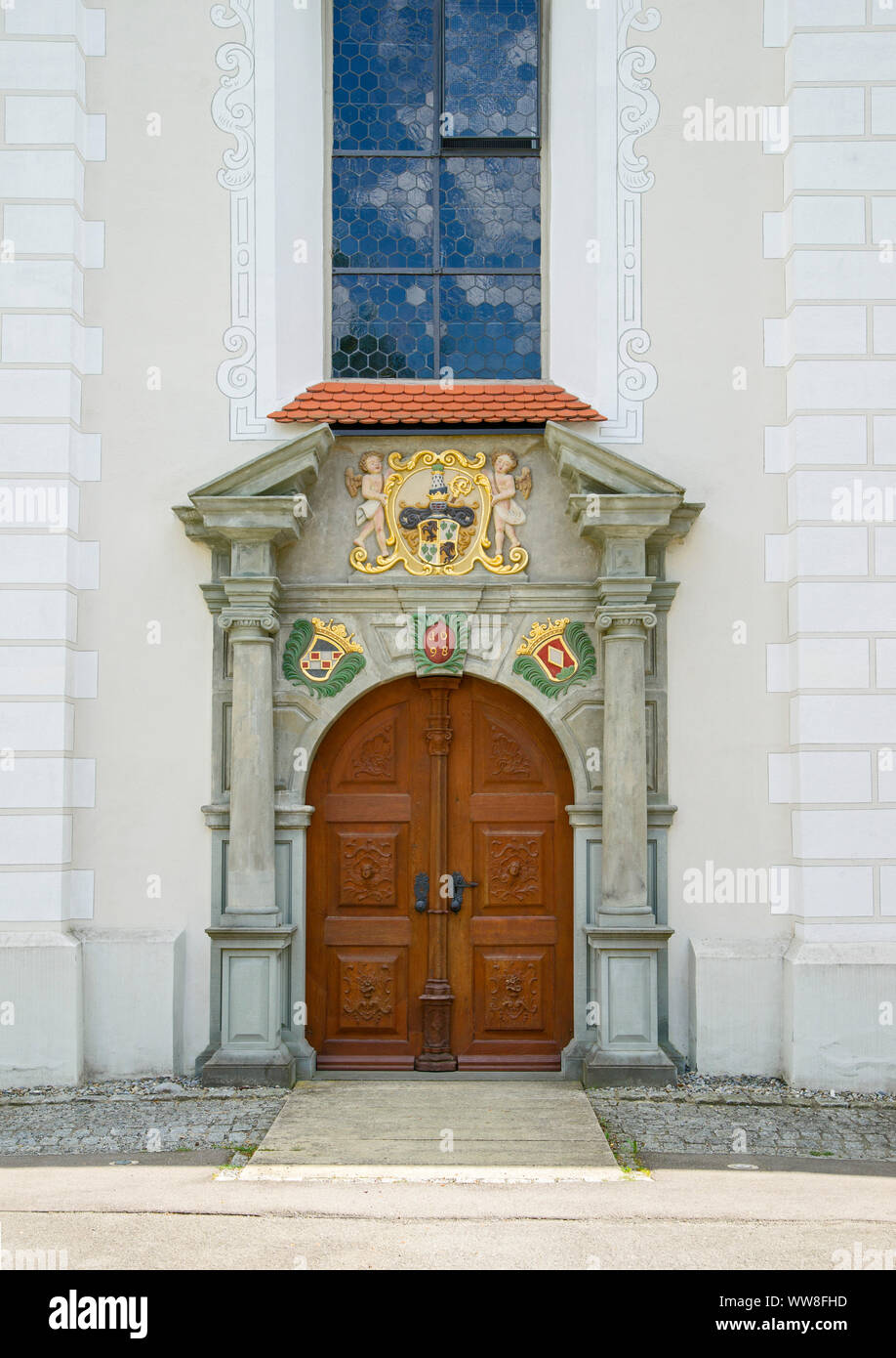 Germany, Baden-WÃ¼rttemberg, Wald, monastery Wald, former Cistercian nunnery, portal from 1698 with the coat of arms of the abbess Maria Jakobe von Bodman (above), and of the founder Burkhard von Weckenstein (right) left of the Cistercian beams Stock Photo