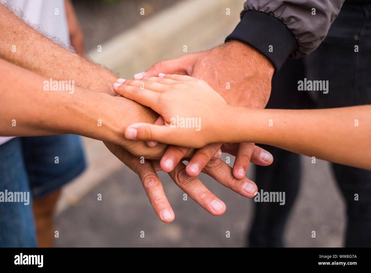 team and family concept image with hands touching together in outdoor, love and relationship and friendship picture, caucasian people Stock Photo