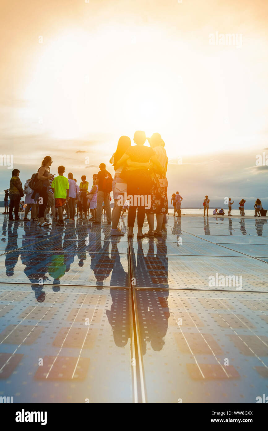 People walking on the modern art installation Greeting to the sun by Nikola Basic, Zara, Zadar, Dalmatia, Croatia, Europe Stock Photo