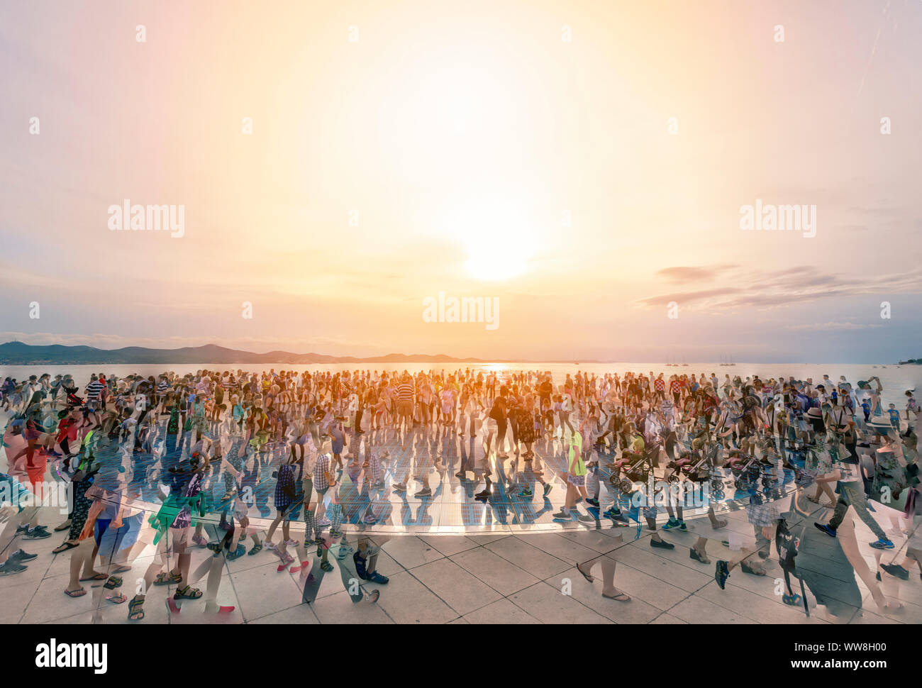 People walking on the modern art installation Greeting to the sun by Nikola Basic, Zara, Zadar, Dalmatia, Croatia, Europe Stock Photo