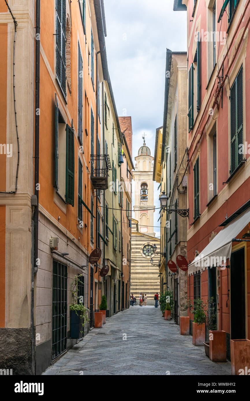 Narrow streets in the historic old part of the Italian city of Albenga in Liguria, Italy Stock Photo