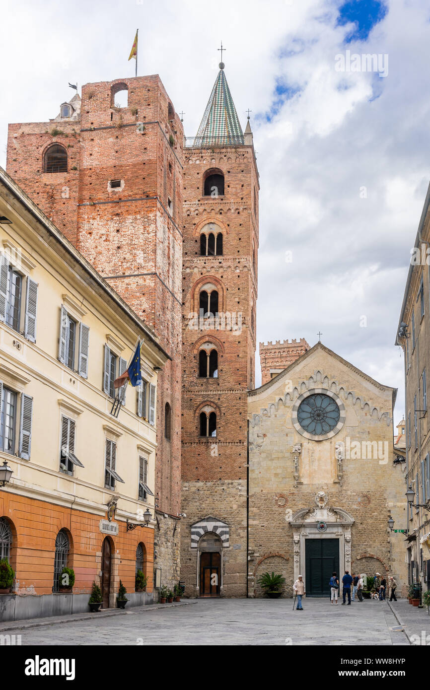 The Towers of Albenga and the Cathedral of St Michael Archangel in the old historic part of the city of Albenga in Liguria, Italy Stock Photo