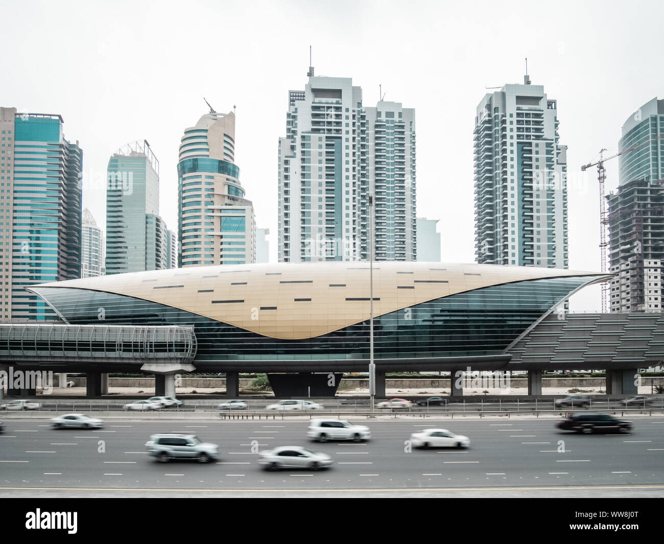 Futuristic building of Dubai metro station and highway in Dubai, United Arab Emirates Stock Photo