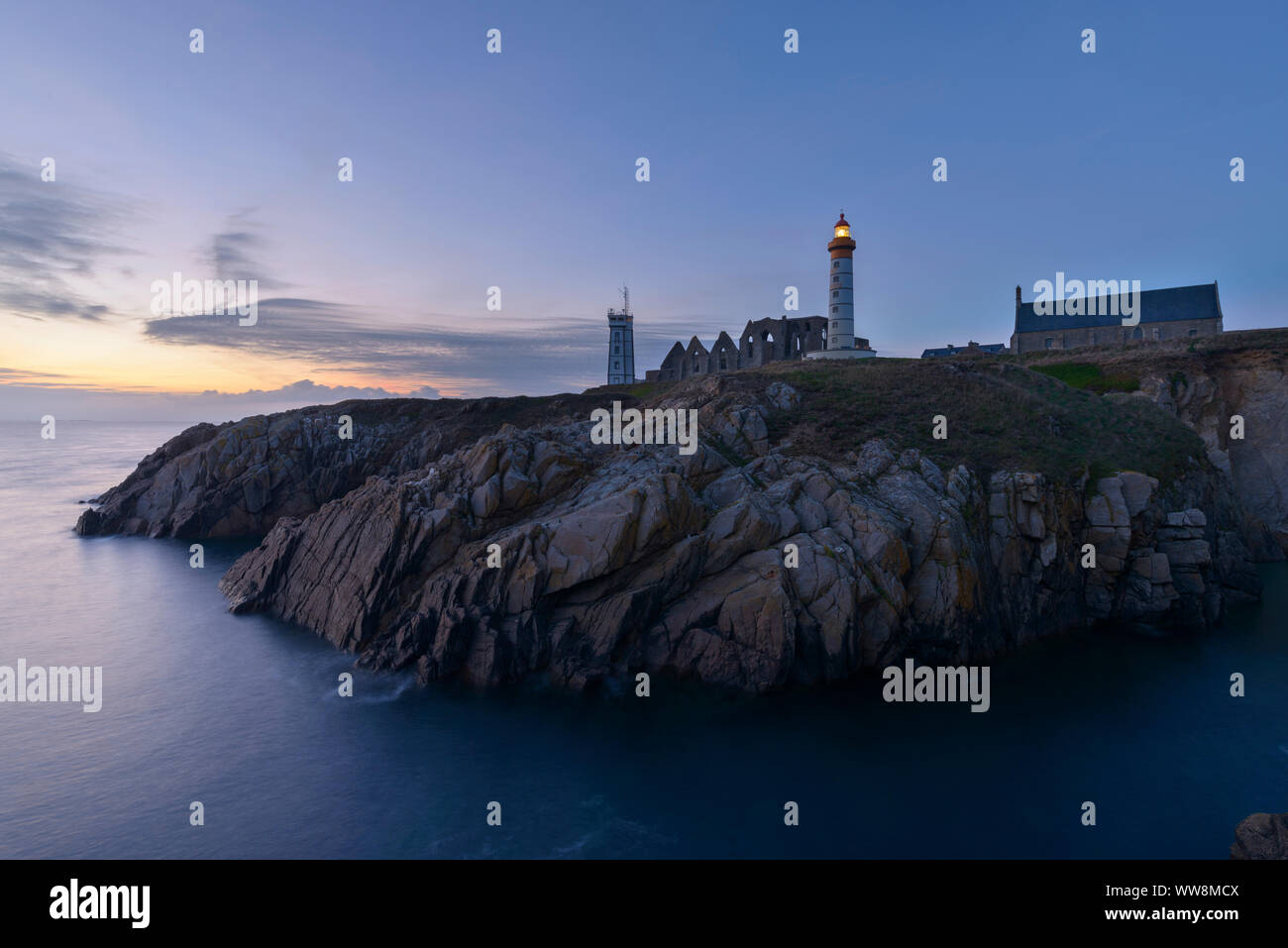 Lighthouse in the evening with beacon, Saint Mathieu lighthouse, Pointe ...