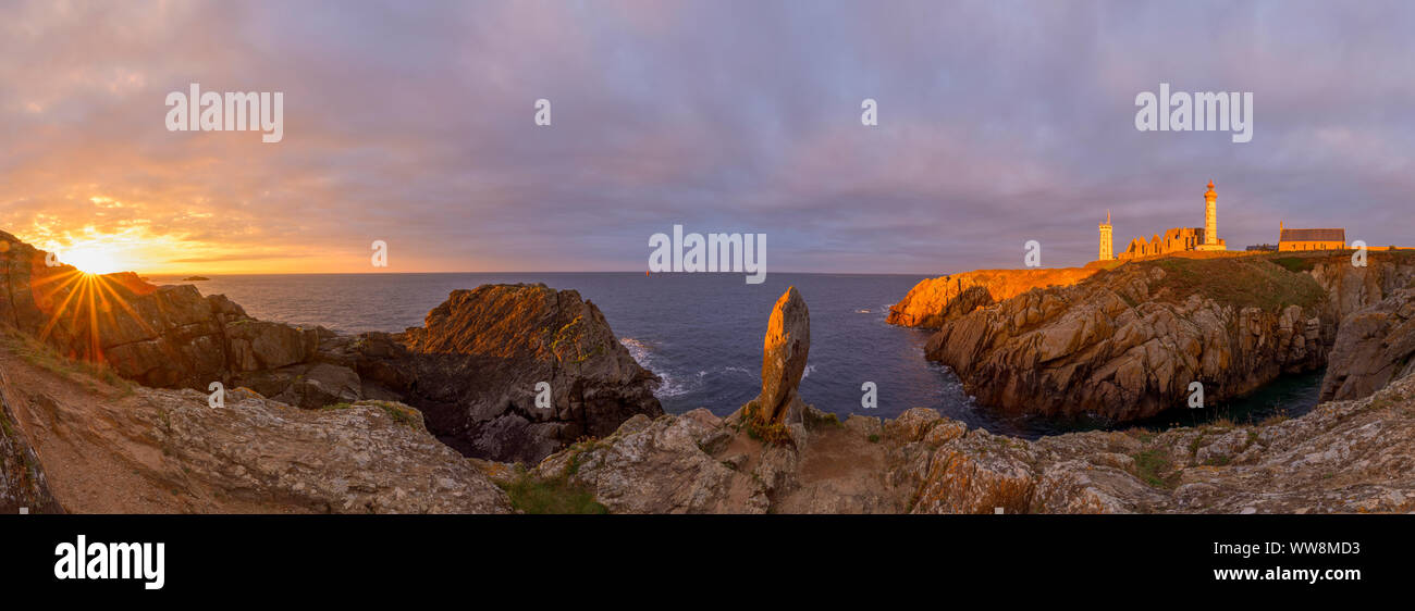 Bay with monolith and lighthouse at sunrise, Saint Mathieu lighthouse ...