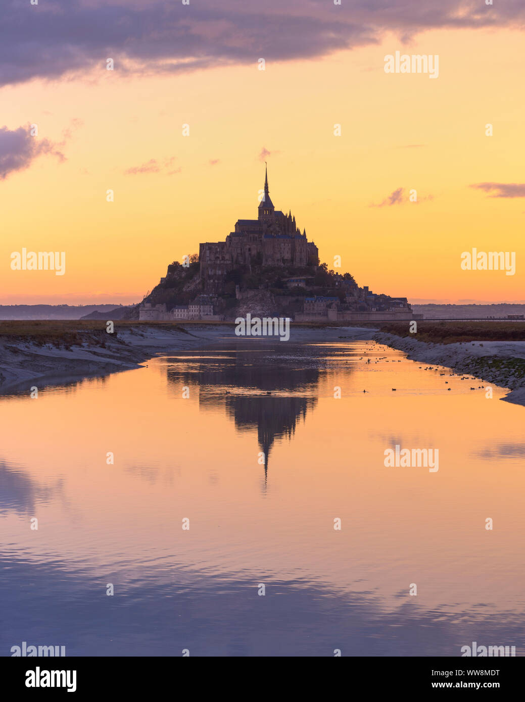 Mont-Saint-Michel and Couesnon river at sunrise, Manche department, Normandy, France Stock Photo