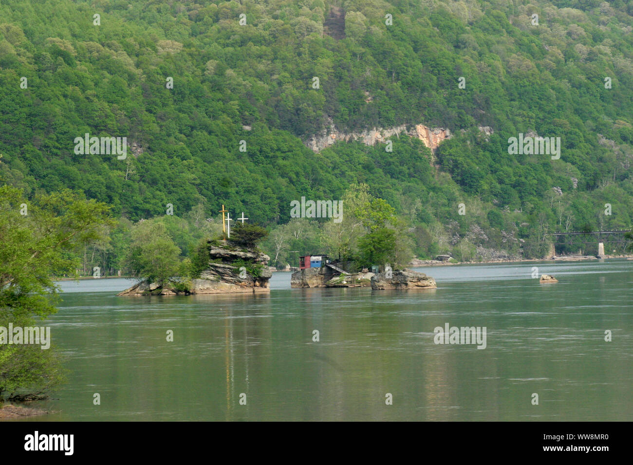 Gauley River in West Virginia, USA, with three crosses visible on a rock, a Christian symbol of resurrection Stock Photo