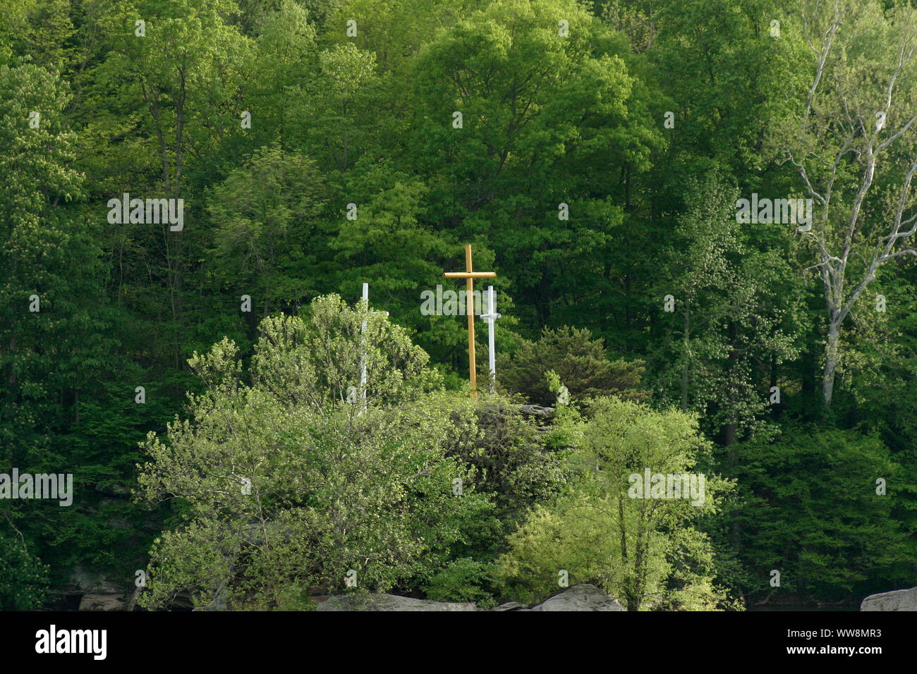 Gauley River in West Virginia, USA. Three crosses visible on a rock, a Christian symbol of resurrection. Stock Photo