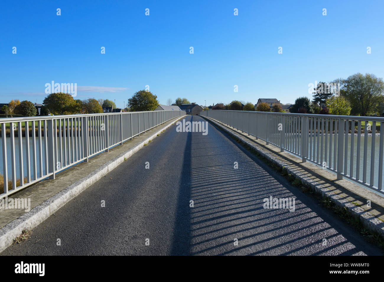 Bridge over Couesnon river in the morning, Manche department, Normandy, France Stock Photo