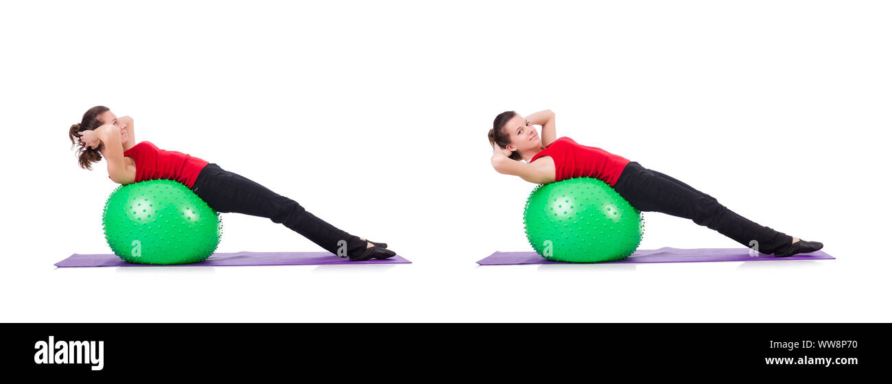 The young woman exercising with swiss ball Stock Photo - Alamy
