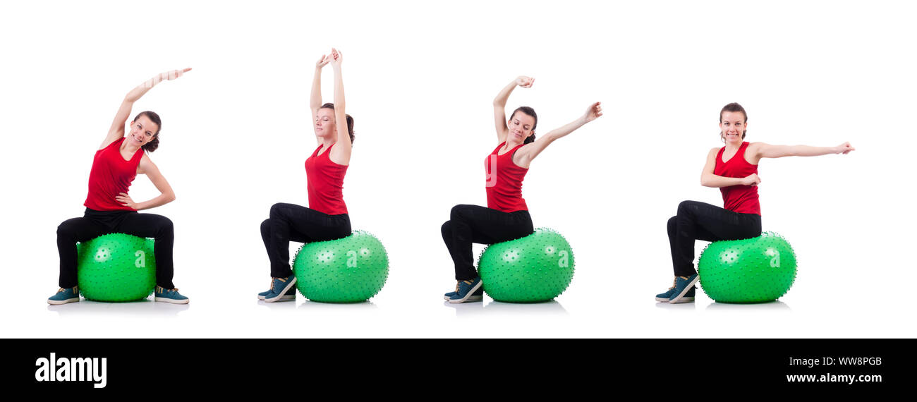The young woman exercising with swiss ball Stock Photo - Alamy