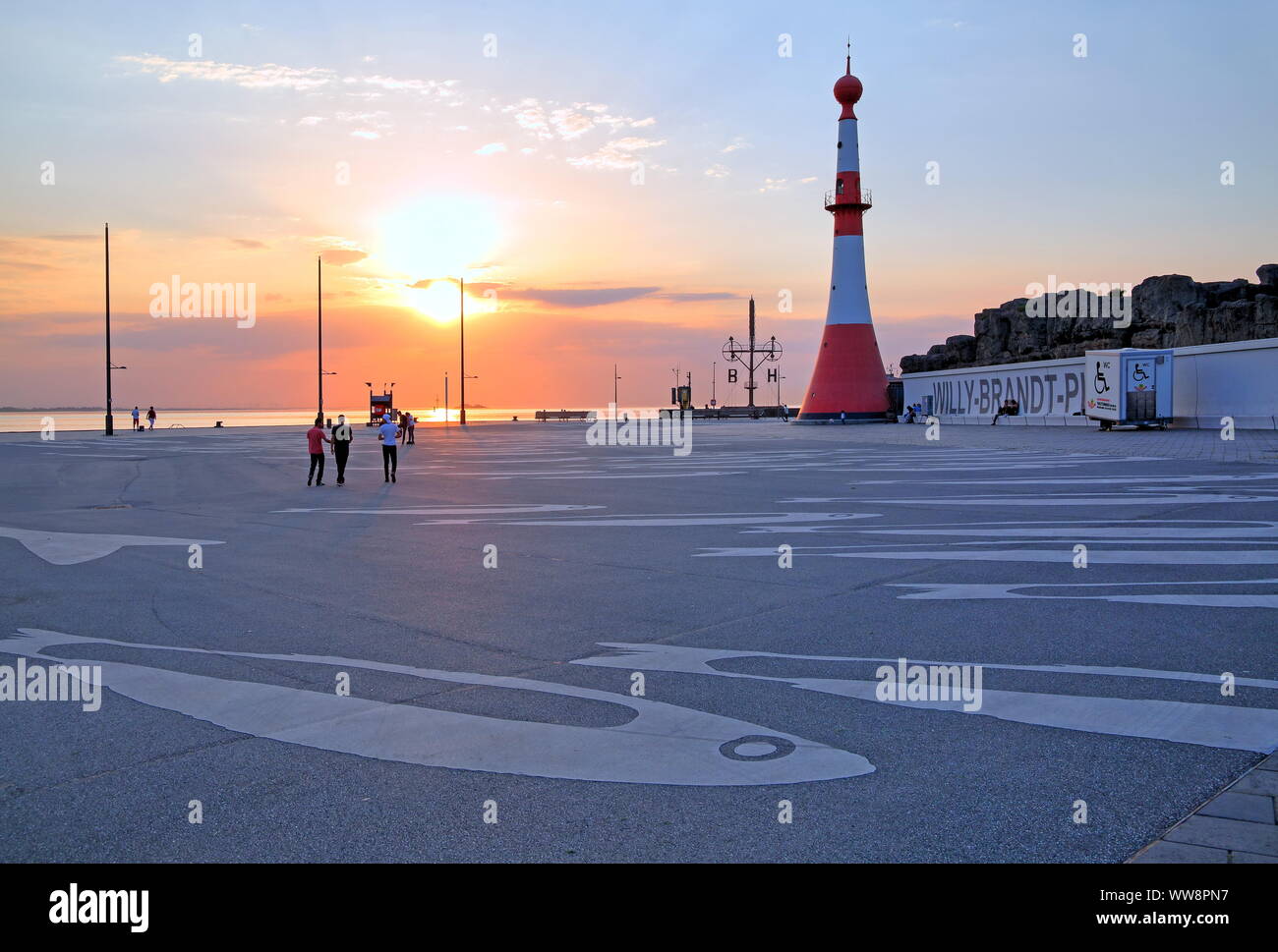 Willy-Brandt-Platz at the Weser with lighthouse Minarett at sunset, Bremerhaven, mouth of the Weser, Land Bremen, Northern Germany, Germany Stock Photo