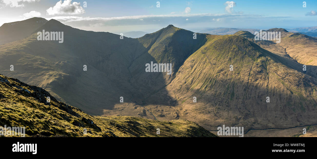 The peaks of Ben More, A' Chìoch, Beinn Fhada and An Cruachan, over Glen Clachaig, from Cruachan Dearg, Isle of Mull, Scotland, UK Stock Photo