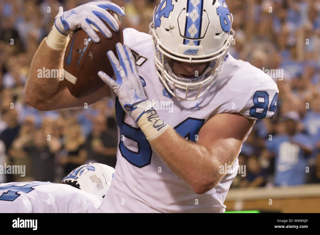 Winston-Salem, North Carolina, USA. 13th Sep, 2019. North Carolina tight end, Garrett Walston (84), catches a pass for the two-point conversion in the fourth quarter of an NCAA football game between the North Carolina Tarheels and the Wake Forest Demon Deacons at BB&T Field in Winston-Salem, North Carolina on September 12, 2019. Credit: Spencer Lee/ZUMA Wire/Alamy Live News Stock Photo