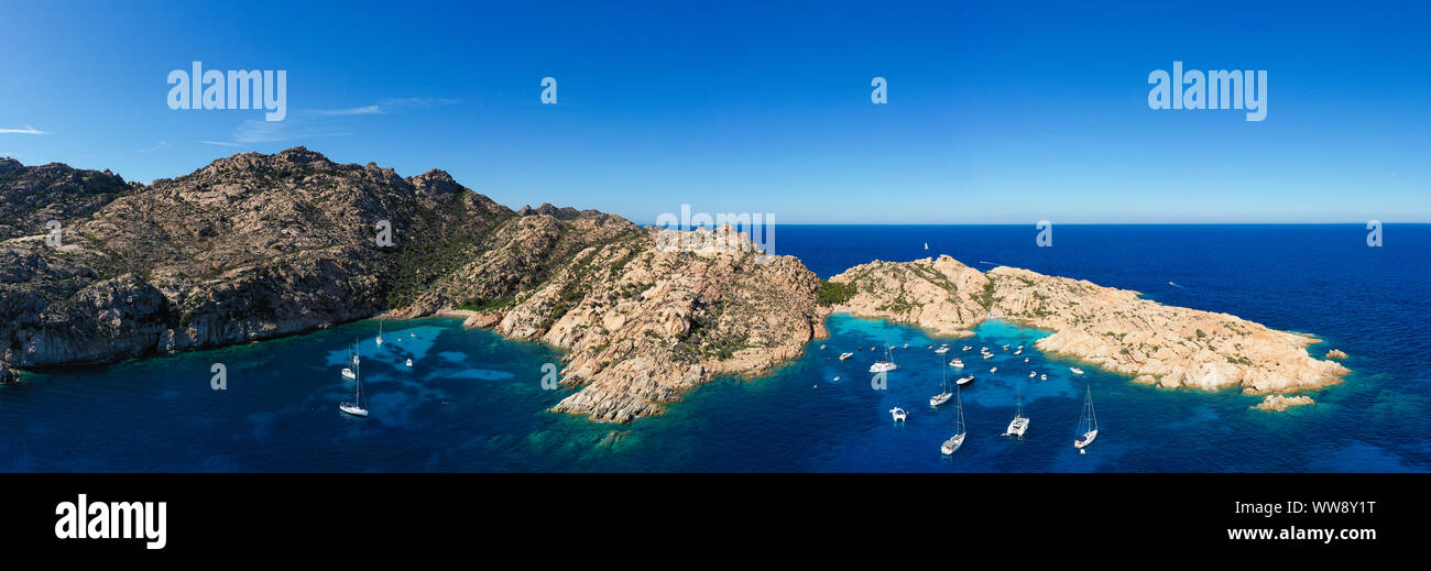 Stunning panoramic view of Cala Coticcio also known as Tahiti with its rocky coasts and small beaches bathed by a turquoise cllear water. Stock Photo