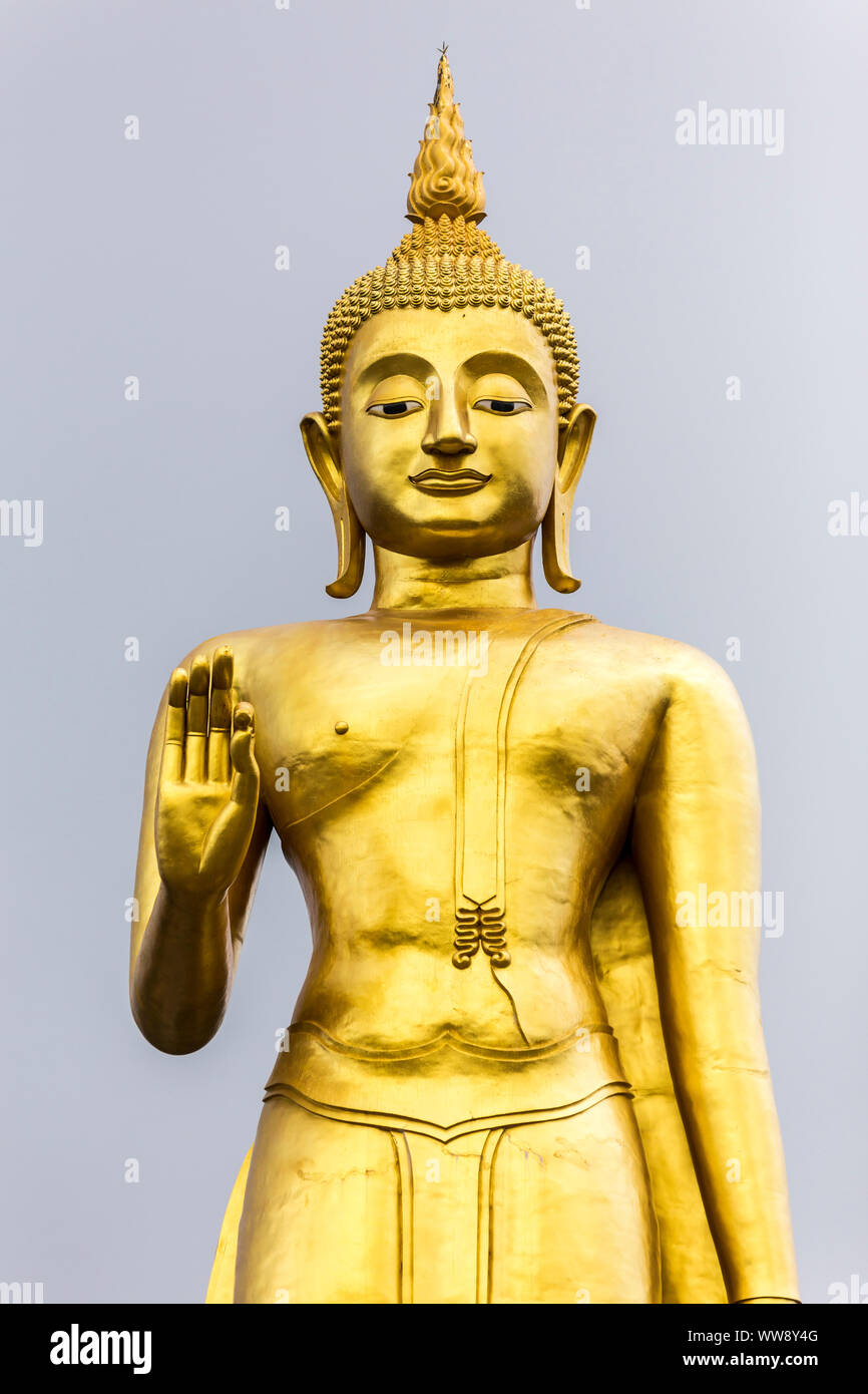 Phra Buddha Mongkol Maharaj tallest Golden Standing Buddha at Hat Yai  Municipal Park, Hat Yai Thailand Stock Photo - Alamy
