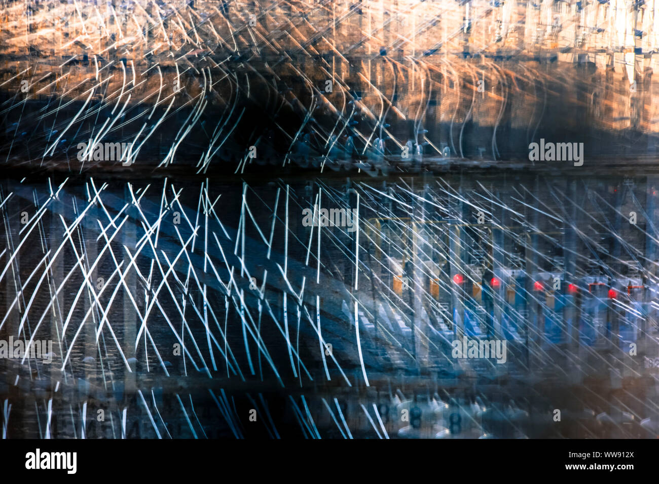 Multiple exposure of railway tracks showing the abstract Stock Photo