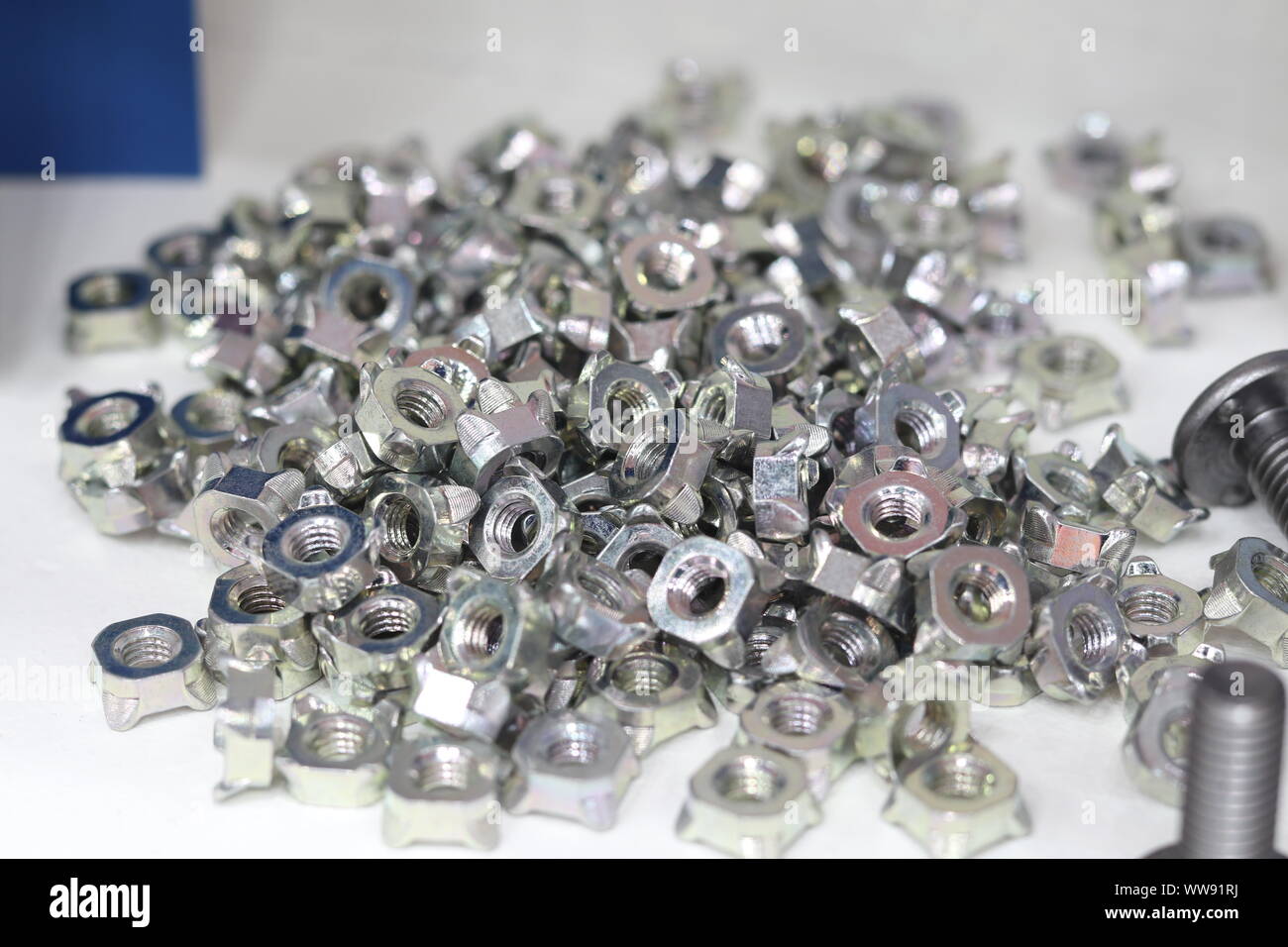 small bolts and nuts by manufacturing process ; tapping Stock Photo Alamy