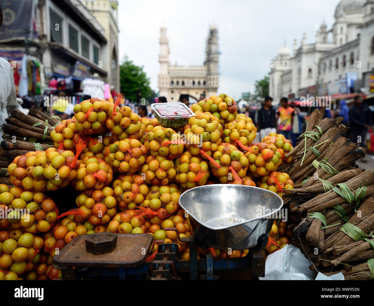 Seller of fruits from the cart on crowded streets of Hyderabad old city in the Andhra Pradesh state Stock Photo