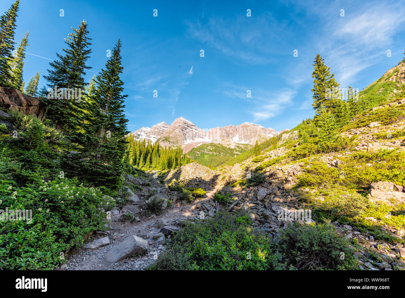 Maroon Bells peak view in Aspen, Colorado in July 2019 summer on trail path road wide angle view Stock Photo