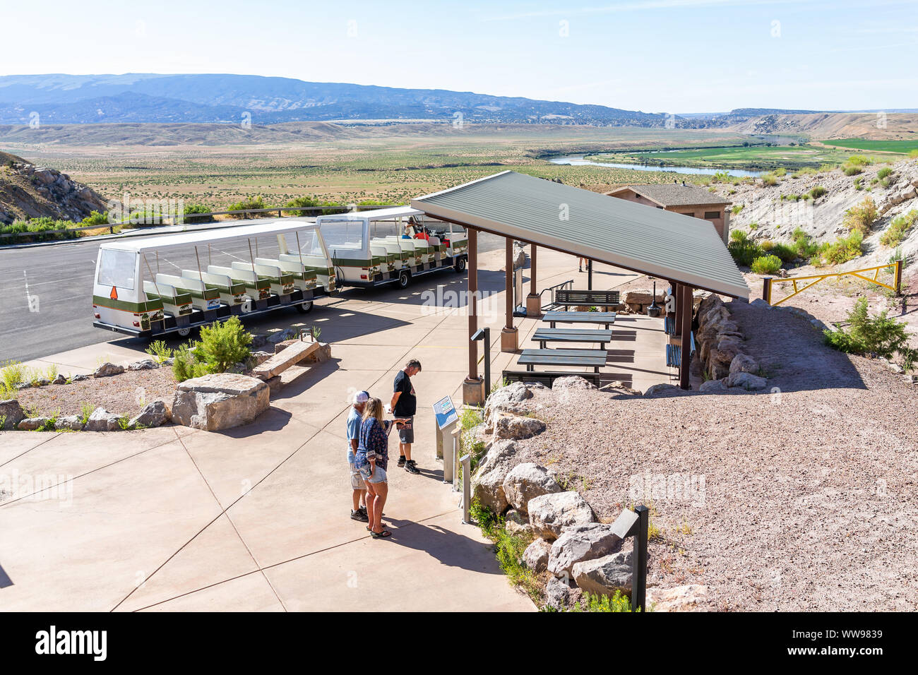 Jensen, USA - July 23, 2019: High angle view of shuttle bus stop, parking lot by Quarry visitor center exhibit hall in Dinosaur National Monument Park Stock Photo