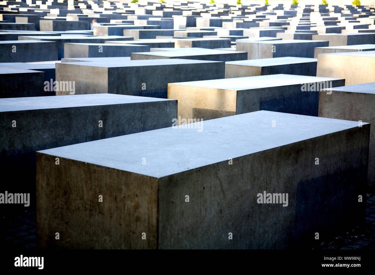 The Holocaust Memorial consists of 2711 grey concrete stelae of varying height. It commemorates the murder of European Jews.  Berlin Germany Stock Photo