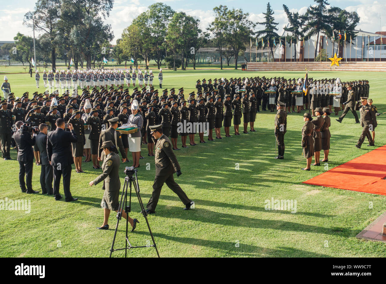 Young police officers-in-training march in unison during a graduation ceremony at General Santander National Police Academy, Bogotá, Colombia Stock Photo