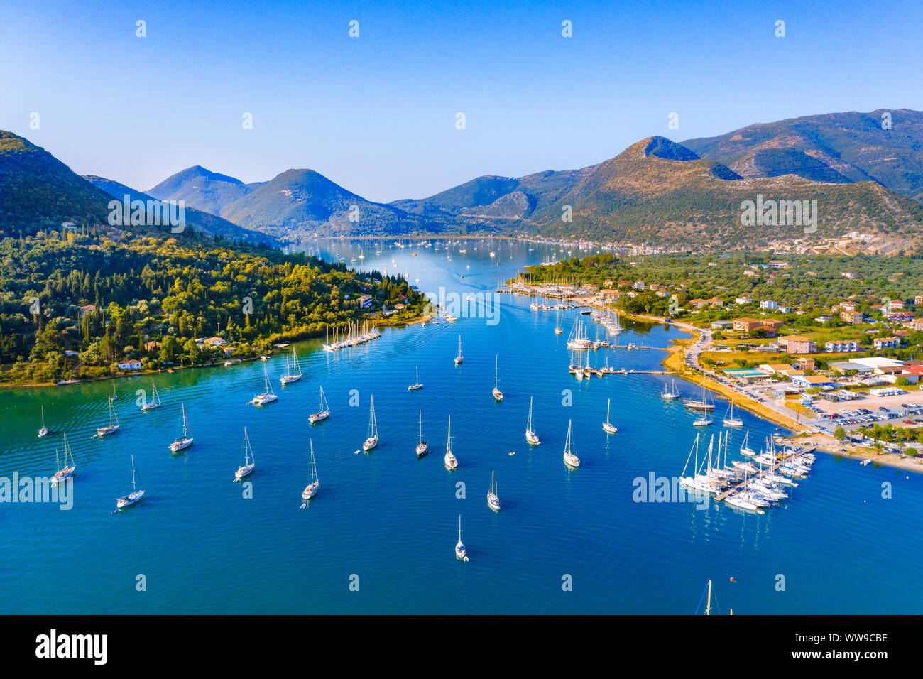Aerial drone bird's eye view photo of iconic port of Nidri or Nydri, Leflkada island, Ionian, Greece Stock Photo