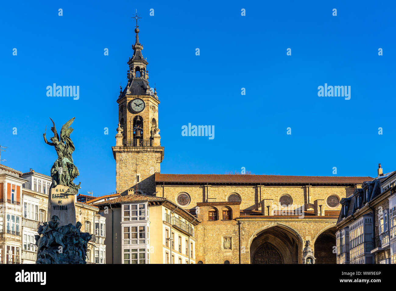 Vitoria-Gasteiz, Virgen Blanca Square. Close up of Monument a la Batalla and tower bell of the Church of San Miguel, Basque Country, Spain Stock Photo