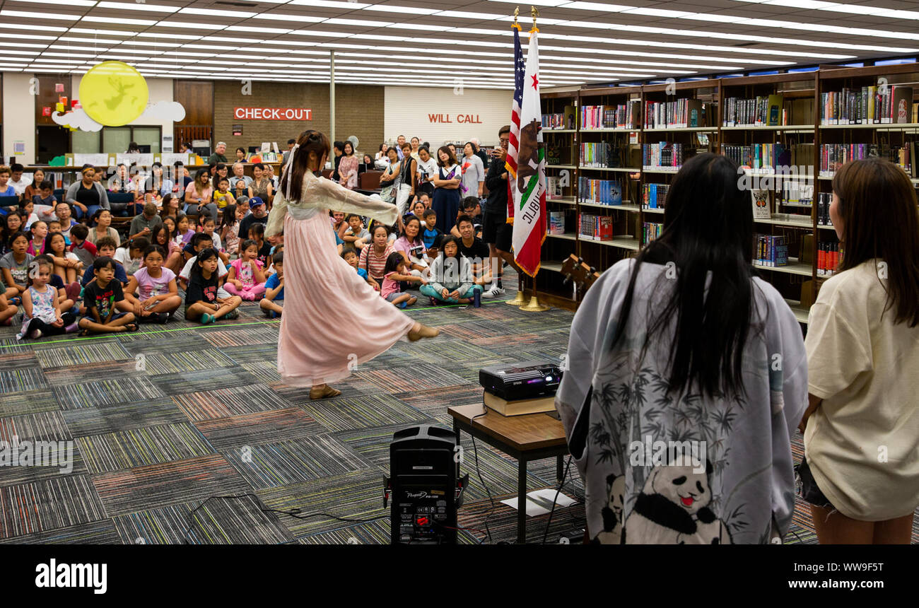 Los Angeles, USA. 13th Sep, 2019. Children attend an event to celebrate the Chinese Mid-Autumn Festival at the library in La Canada Flintridge, California, the United States, Sept. 13, 2019. Credit: Qian Weizhong/Xinhua Stock Photo
