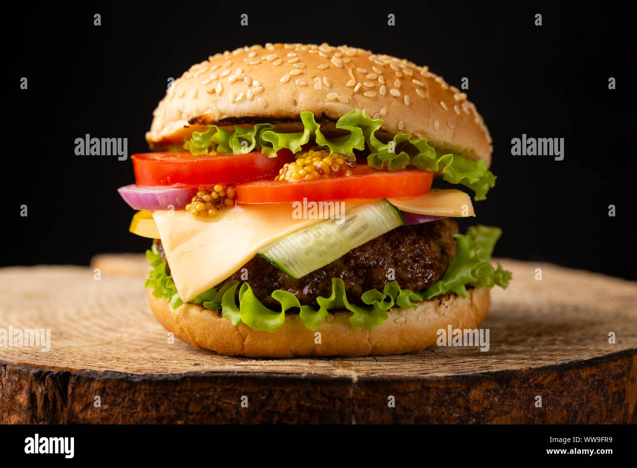 Tasty burger with beef, fast food Stock Photo - Alamy