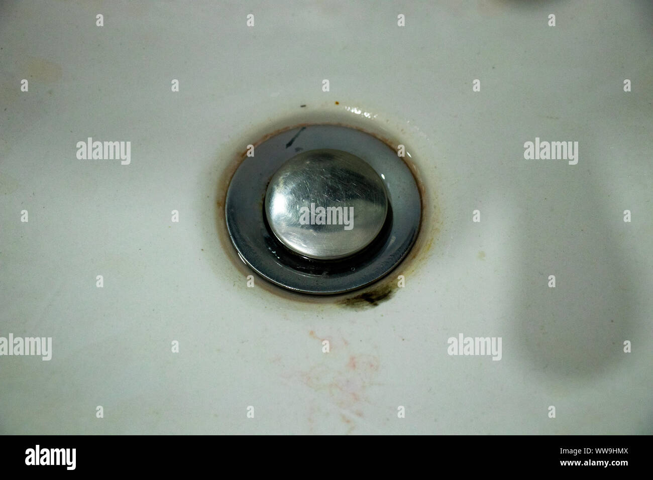 old sink water hole in dark Stock Photo Alamy